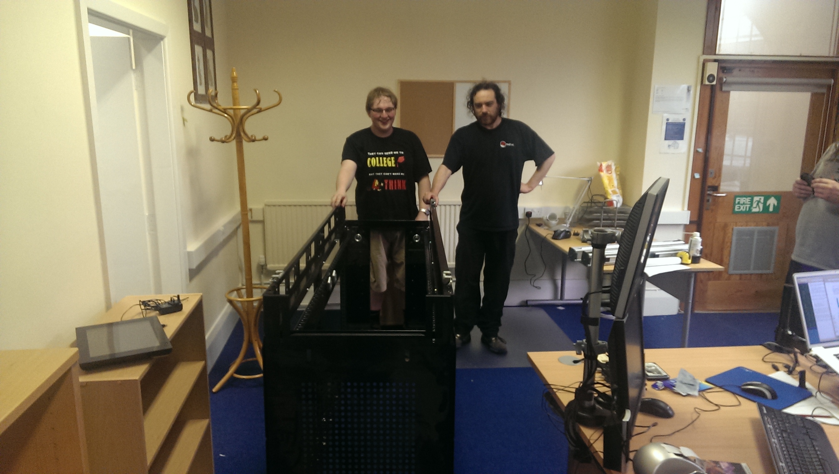 Ian and Tom moving the larger rack (Darth Vader's Coffin)